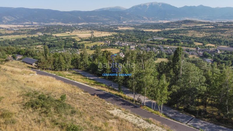 Foto 9997ef7a-2808-4ebf-86de-bd12d08170d5. Terreny residencial a Enveitg