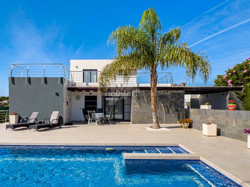 Foto 82369c47-dd2a-44c6-a937-3499899e7fe7. Chalet mit heizung parking pool in La Fustera Benissa