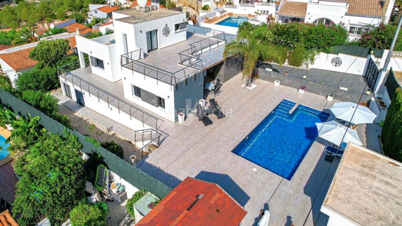 Foto 1f1dc1f5-32cc-472e-8814-5d0d58a591da. Chalet avec chauffage parking piscine dans La Fustera Benissa