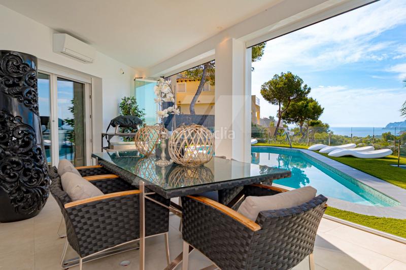 Foto 647644ee-8554-44c1-bf2a-ec3eabbffbb9. Chalet avec chauffage parking piscine dans Paichi Moraira