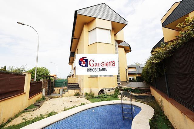 Foto 107988d1-2c89-41c0-9631-5b40469dd8af. Casa amb calefacció piscina a Corralejos-Campo de las Naciones Madrid