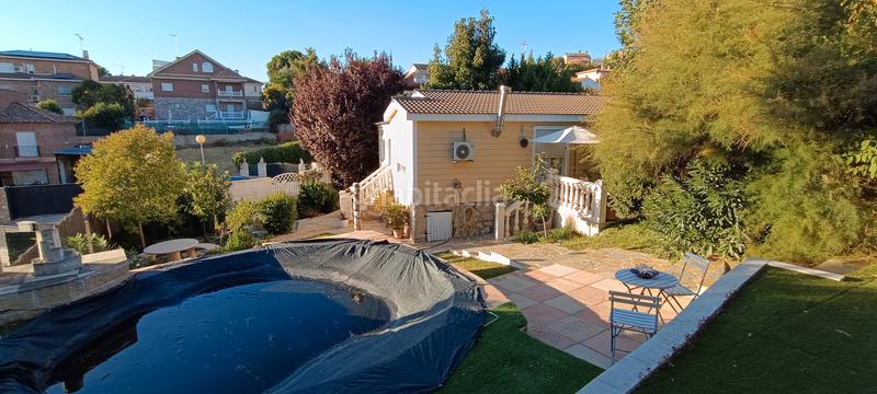 Foto 1d0779aa-fe61-47e7-9200-03033c9b530b. Chalet con camino riscaldamento parcheggio piscina in Torrejón del Rey