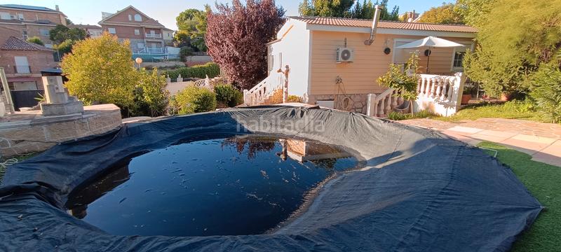 Foto 4541e6ea-6513-4b88-bcb7-dd076b056438. Chalet con camino riscaldamento parcheggio piscina in Torrejón del Rey