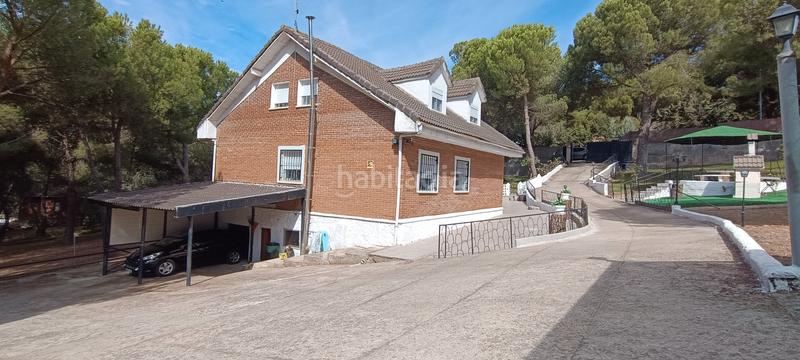 Foto 1b75dc44-c437-4834-bdc2-528bf4aab20d. Chalet avec cheminée chauffage parking piscine dans Uceda