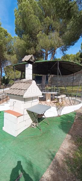 Foto 220a9132-030f-447c-9b11-b664bed9b36b. Chalet avec cheminée chauffage parking piscine dans Uceda