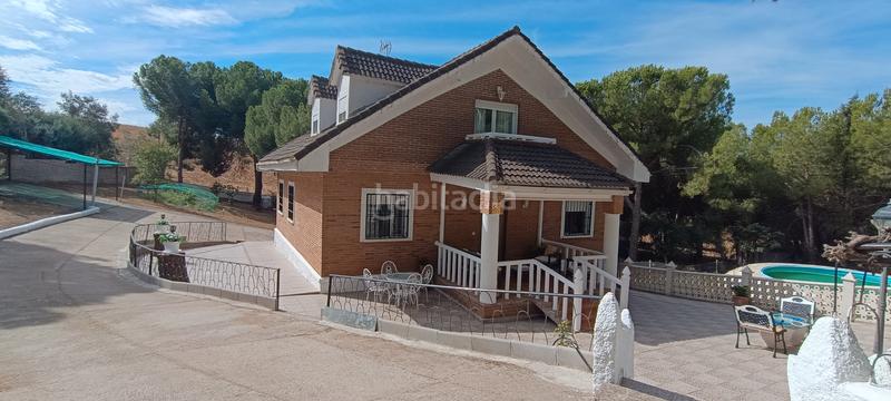 Foto 3f3a47d3-c0ff-482b-a04b-bdd16b229868. Chalet avec cheminée chauffage parking piscine dans Uceda