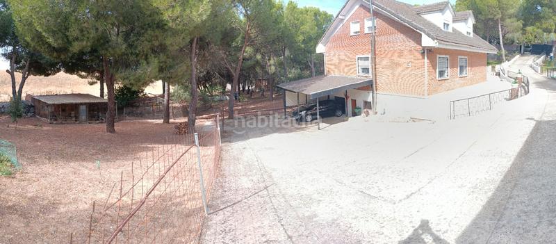 Foto b8994c34-564a-4e90-aba4-960a545932d5. Chalet avec cheminée chauffage parking piscine dans Uceda