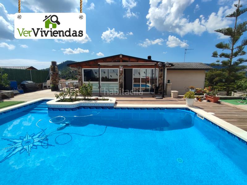 Foto c7d50985-fefc-4a57-9f42-0a58a51095eb. Casa en avinguda dels pinars 77 preciosa casa con piscina en Vallirana
