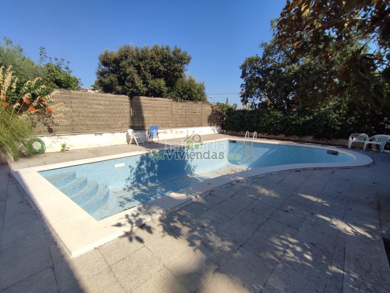 Foto 1bb62604-85c1-4816-8431-6776caceb2ca. Casa amb xemeneia calefacció aparcament piscina a Torrelles de Llobregat