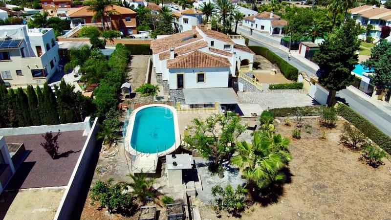 Foto 8dcb236a-208f-46c7-8212-19fadd5398fd. Casa amb calefacció aparcament piscina a El Montgó Dénia