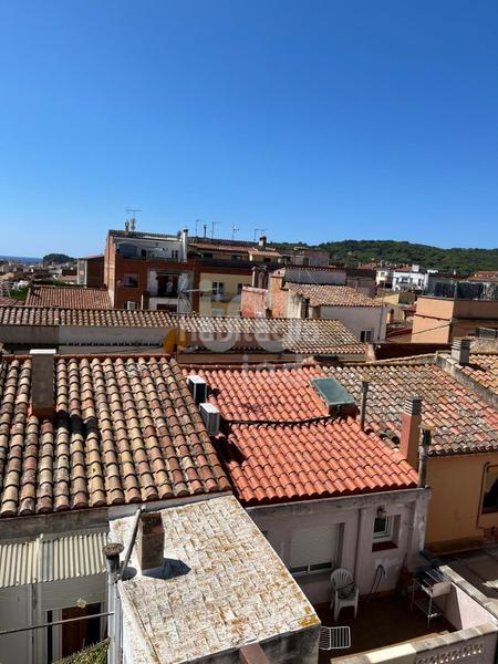 Foto c9294359-ce05-4a44-bf17-bcf294c8f980. Casa en Eixample Sant Feliu de Guíxols
