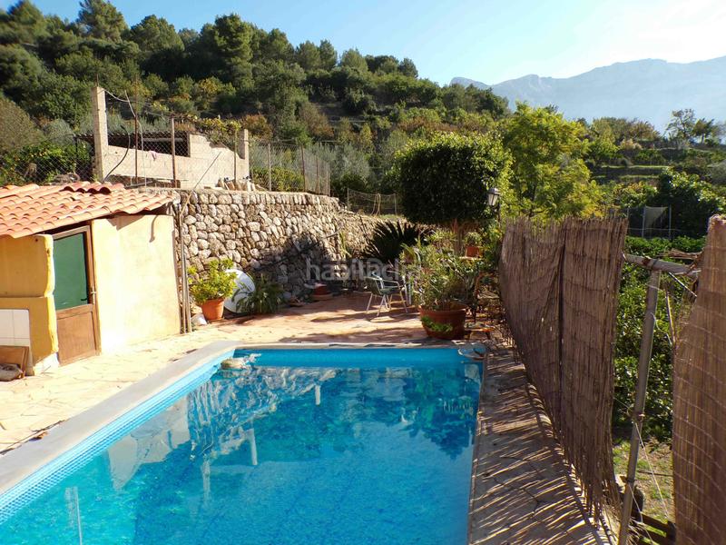 Foto fc76add8-b088-4814-99d4-ec13bf2c01f0. Casa amb aparcament piscina a Sóller