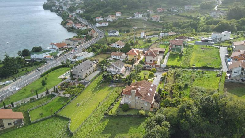 Foto ec4f2723-7146-4990-a4d5-0d5f42fd8bdd. Terreno residenziale in Poio