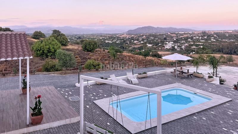 Foto 749efdce-cbbd-4a1c-95a2-e7644550e935. Casa amb calefacció aparcament piscina a Centro Alhaurín el Grande