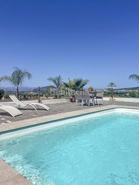 Foto a9512d10-54fa-4f24-a853-1efa0790d146. Haus mit heizung parking pool in Centro Alhaurín el Grande