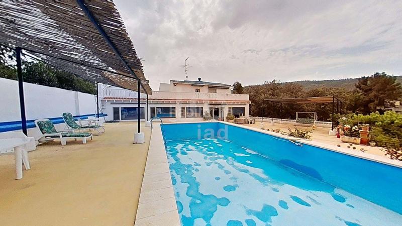 Foto b4a24bd5-2d81-48e1-bd80-a305732fa125. Maison avec parking piscine dans Ibi