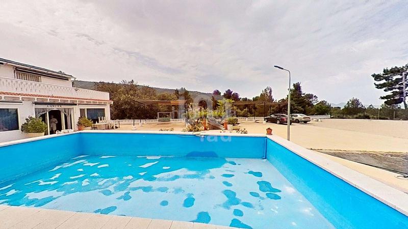 Foto d74e3171-9f86-4c61-83e4-bfd028d11337. Maison avec parking piscine dans Ibi