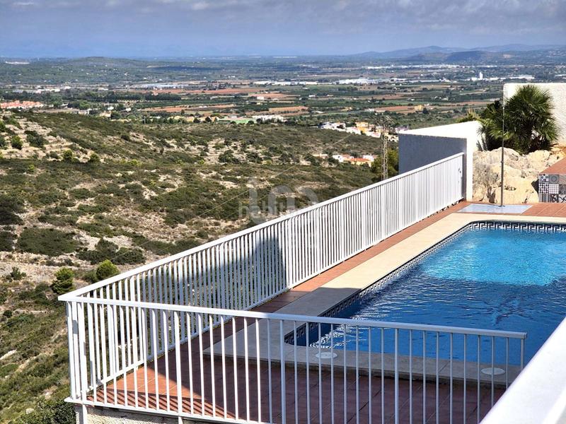 Foto f33cd215-9e8c-4872-b8ec-85c0e3cb4a4d. Casa amb calefacció aparcament piscina a Las Atalayas-Urmi-Cerro Mar Peñíscola