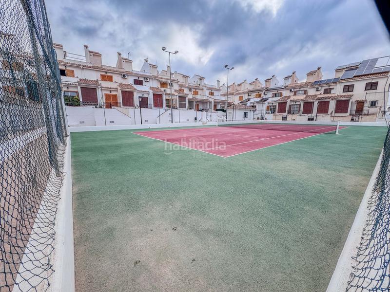 Foto 321c9810-c3b1-4fe2-85a3-279019a1ae6c. Casa aparellada amb calefacció piscina a Monte Faro-Altomar II Santa Pola