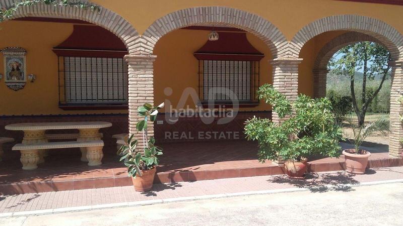 Foto 208802b3-644e-4a5c-aa72-8d918c527133. Finca rústica a Lora del Río