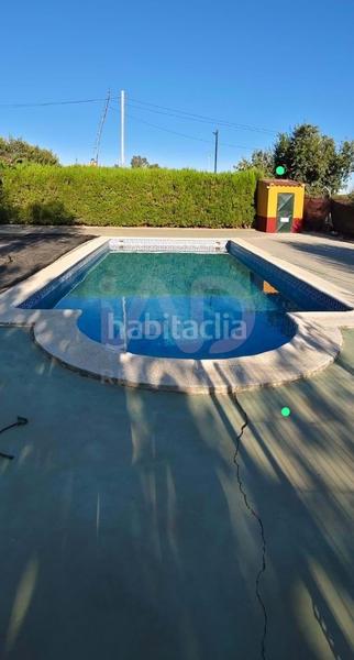 Foto 7b558028-1cf0-4c9b-a474-756820428a1b. Finca rústica en Lora del Río