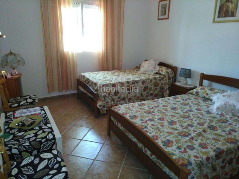 Foto f3410681-65bd-4be1-a98d-d8d45a6ec6d6. Finca rústica en Lora del Río