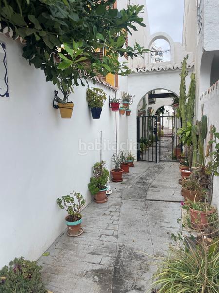 Foto be07764f-d610-4196-b5c4-faaeb6df507a. Casa pareada en las palmeras 72 en Parque de la Paloma Benalmádena