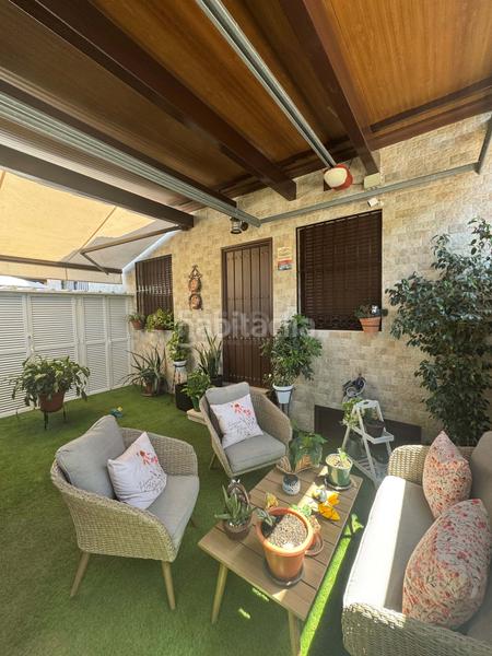 Foto b8ca7fbf-97e9-4d5c-9083-496e64fc0ca1. Casa aparellada amb calefacció a Palmete Sevilla