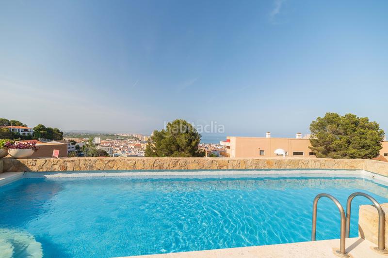 Foto ccdca9d1-e290-4ec6-a75e-54fac3f12fc4. Casa aparellada amb calefacció piscina a Las Atalayas-Urmi-Cerro Mar Peñíscola