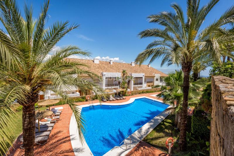 Foto 4d70e2cf-7a77-4e5c-92f3-731037102f0d. Casa aparellada amb calefacció aparcament piscina a Mijas