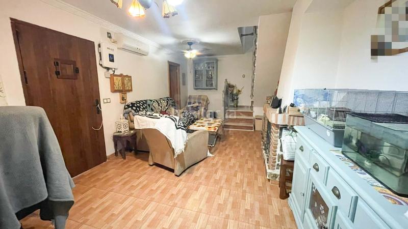 Foto 34aa28e4-b9ec-4af3-8800-fe418c1bad44. Casa pareada en Coín