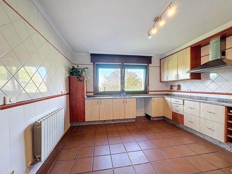 Foto 0c10b7ab-1a35-42d4-9837-cd6cb84ba599. Casa con riscaldamento parcheggio in Priegue Nigrán