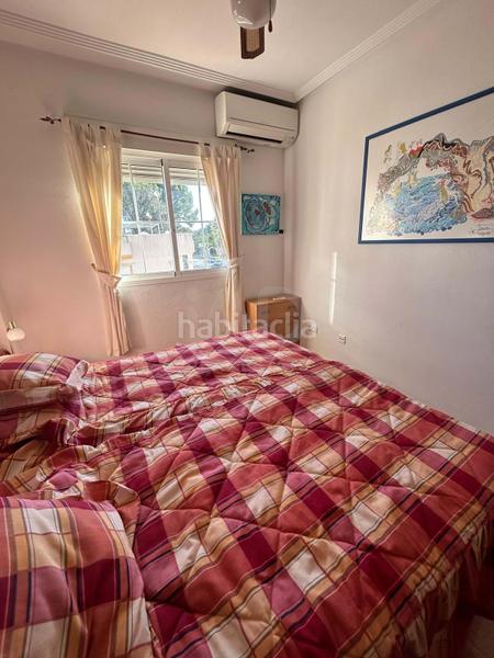 Foto f61c9b1f-dc47-445c-a34e-bae9fb1dc70c. Flat with heating pool in Villamartín-Las Filipinas Orihuela