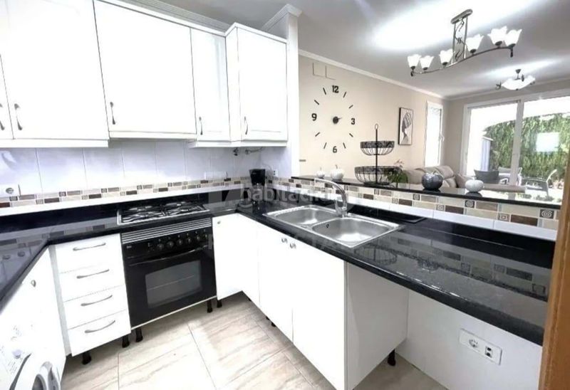 Foto 6ea9b6ae-4b9f-4948-9ff3-8f42b8a9938c. Casa aparellada amb calefacció aparcament piscina a Calp