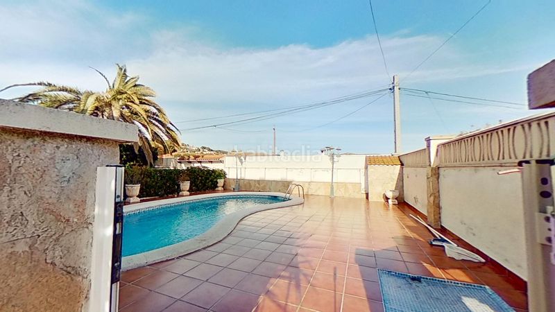 Foto ae6ca2b1-6f8b-4627-9879-8b66bf262356. Casa amb aparcament piscina a Els Masos - Els Garrofers Coma-ruga