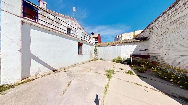 Foto a651dba2-00d9-45d5-b731-43757a1bd0fe. Casa amb aparcament a Camarles