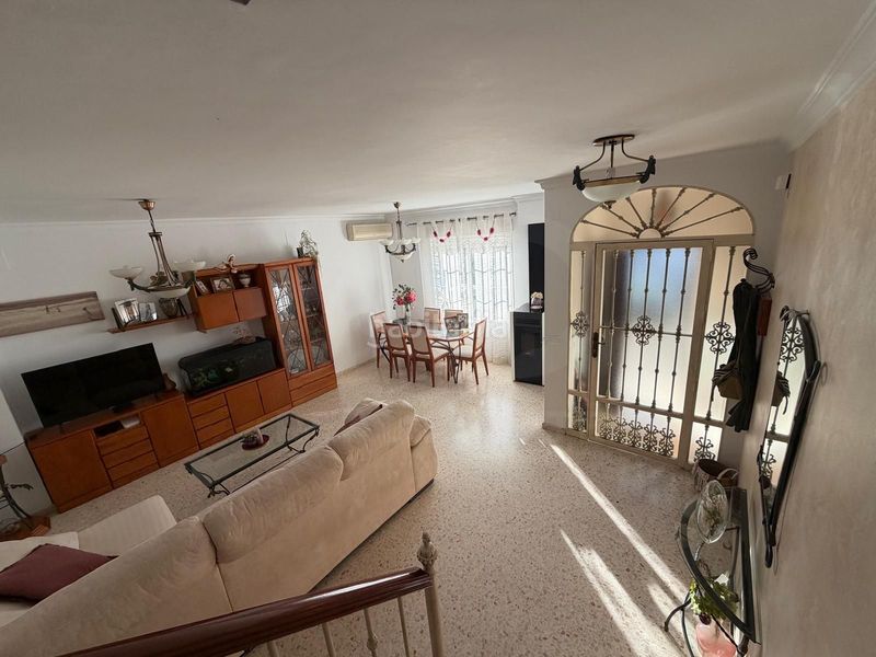 Foto de5af290-1ed0-46b0-a4a1-c0ae6ac8ba5a. Casa aparellada amb calefacció aparcament a Lepe