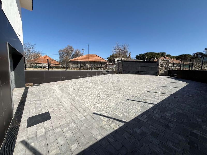 Foto e77ba421-011f-4966-bf59-6bbf423b6e2e. Casa amb calefacció aparcament piscina a Casa Amarilla Galapagar