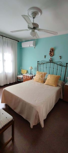 Foto ec07a389-9b81-42df-9d10-6f4628a9b9dc. Casa aparellada amb calefacció a Écija