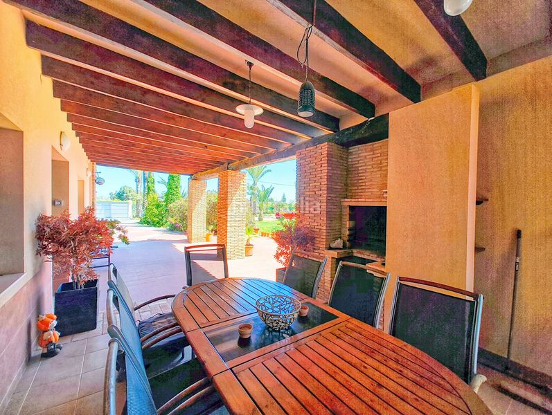 Foto 177ebeec-b81f-4060-8554-581c5f2727e1. Casa amb calefacció aparcament piscina a Las Bayas Elche / Elx