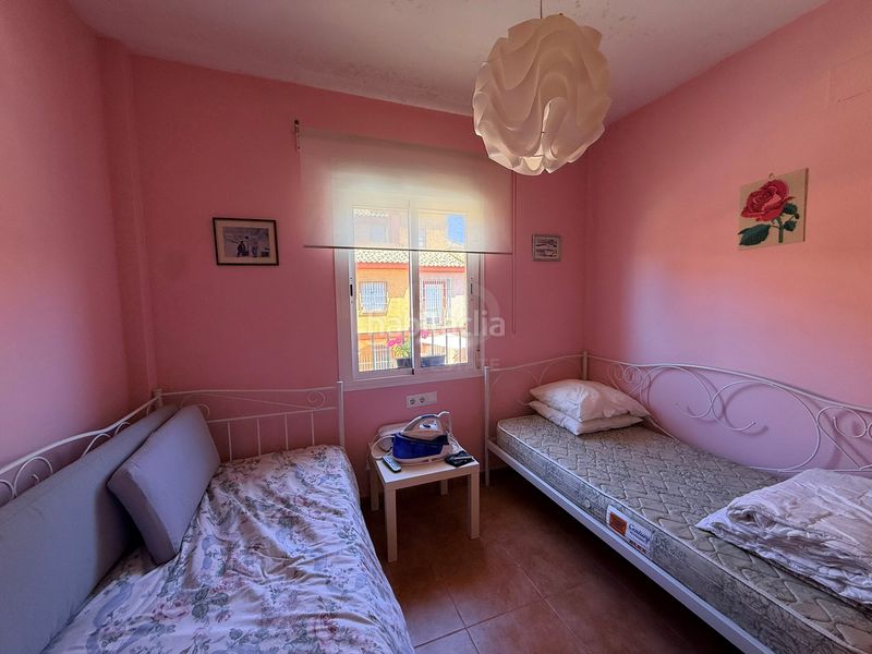 Foto 0d962c59-0ab5-4c54-9698-878e1f18de43. Casa aparellada amb calefacció piscina a Lepe