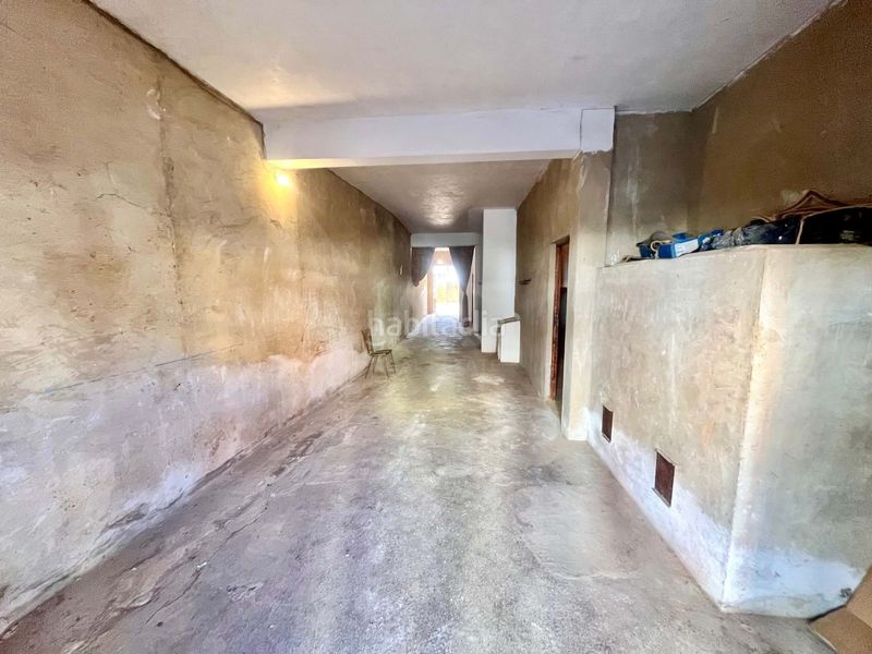 Foto 26755fbf-504f-4525-b59a-8d10f38ce070. Casa aparellada amb calefacció aparcament a Benlloc