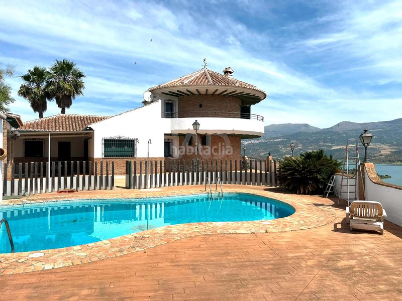 Foto 11fe9faf-e955-4edc-8ed2-3ce09a8ccf21. Casa amb aparcament piscina a Viñuela