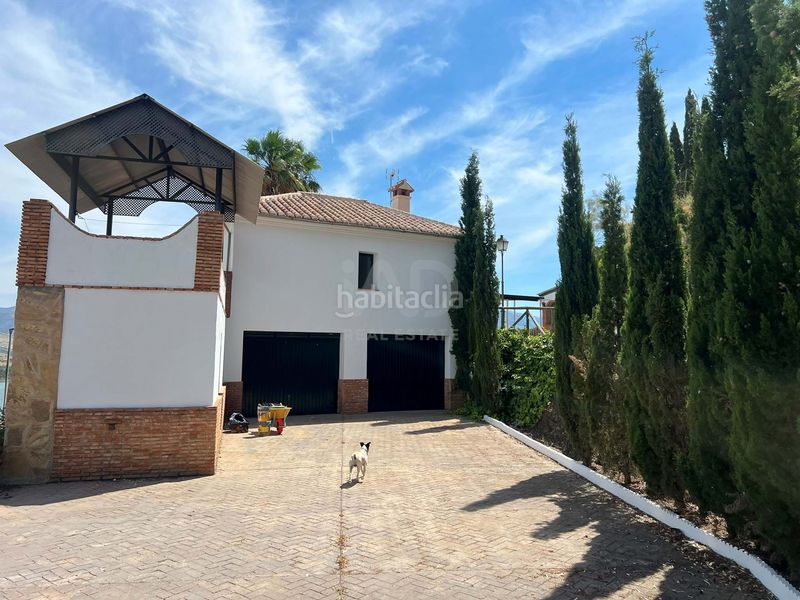 Foto 4234cfd1-9b32-4820-bdf8-d76b9f93e56e. Casa amb aparcament piscina a Viñuela