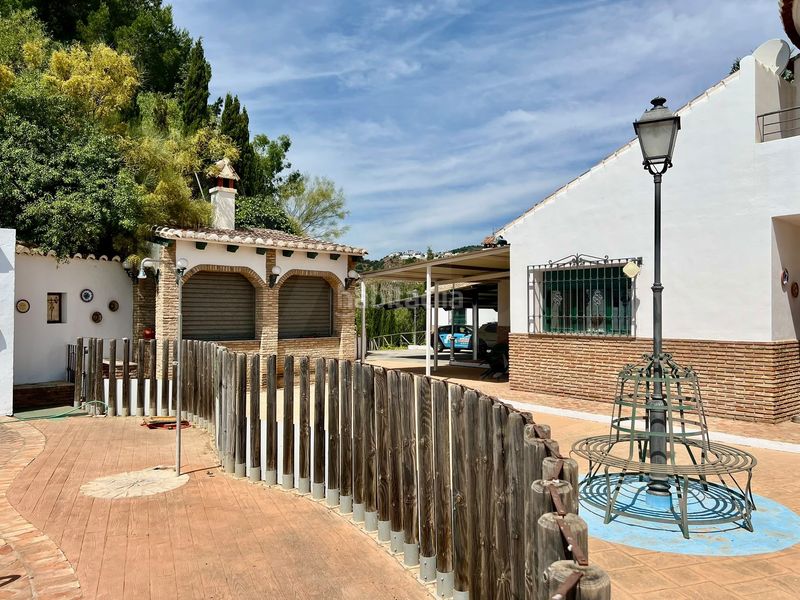 Foto bafb8e83-3cff-4fef-b77d-2e47794bdb97. Casa amb aparcament piscina a Viñuela
