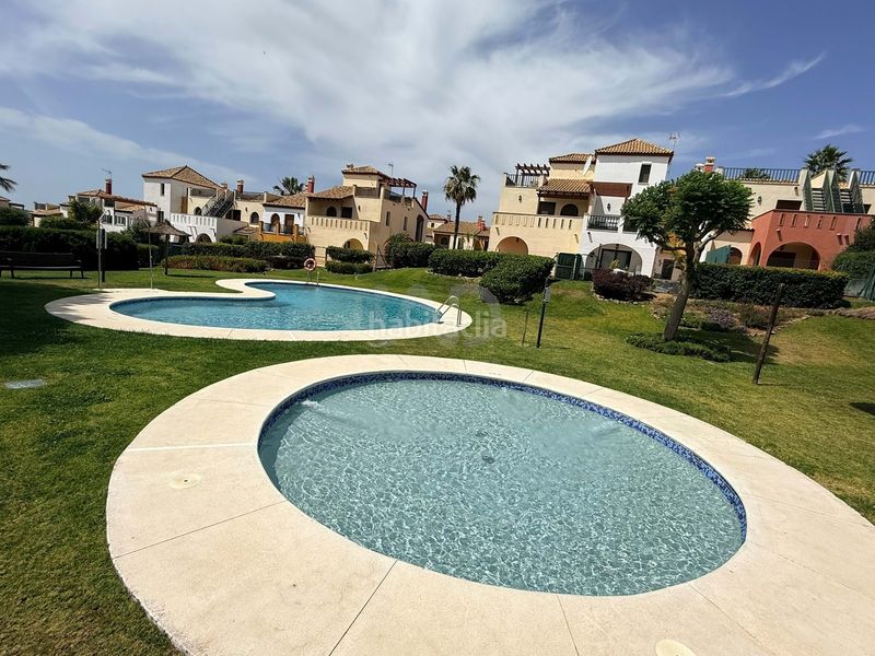 Foto 8e1d9977-a723-4b04-8c39-3de57fbf2977. Casa aparellada amb calefacció piscina a Costa Esuri Ayamonte