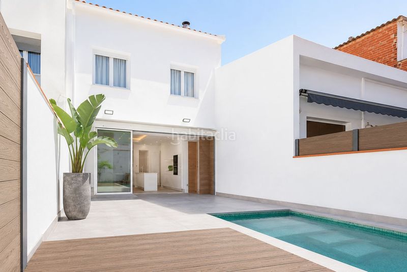 Foto 72dd0319-dae9-420d-ac34-87330542dd18. Casa aparellada amb calefacció aparcament piscina a Sabadell