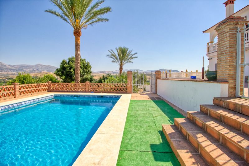 Foto 729ba2d9-63fb-409f-bd2a-b5e7007da6dd. Casa amb calefacció aparcament piscina a Álora