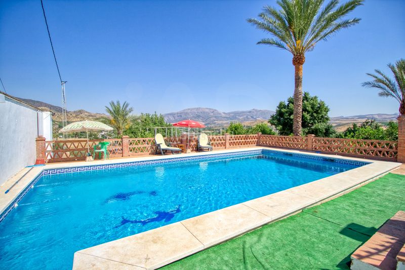 Foto be98c773-5a82-4c7d-aad6-75e4c5cf7bbe. Casa amb calefacció aparcament piscina a Álora