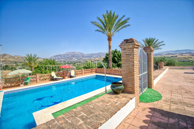 Foto e096198b-d2f4-4b5f-9e67-605af4f0eab0. Casa amb calefacció aparcament piscina a Álora